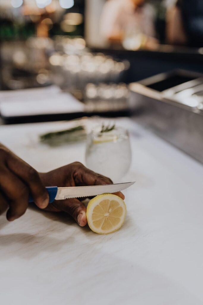 strikers-lounge-hand-slicing-lemon-bar-prep